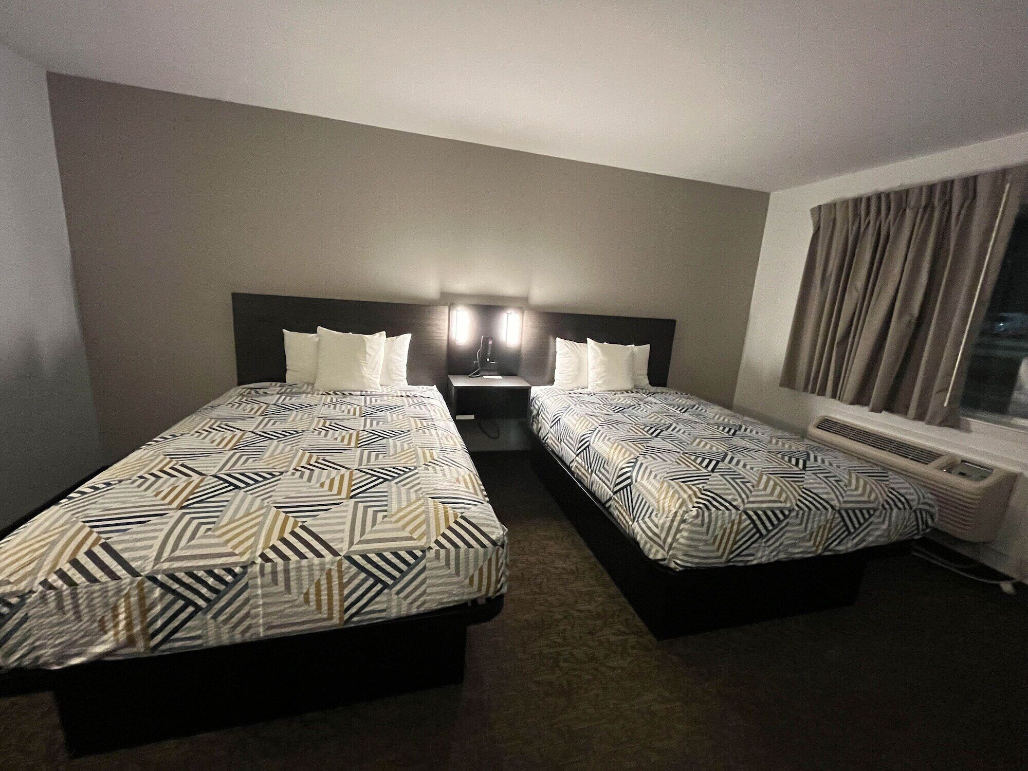 Desk, laptop workspace, blackout drapes, soundproofing