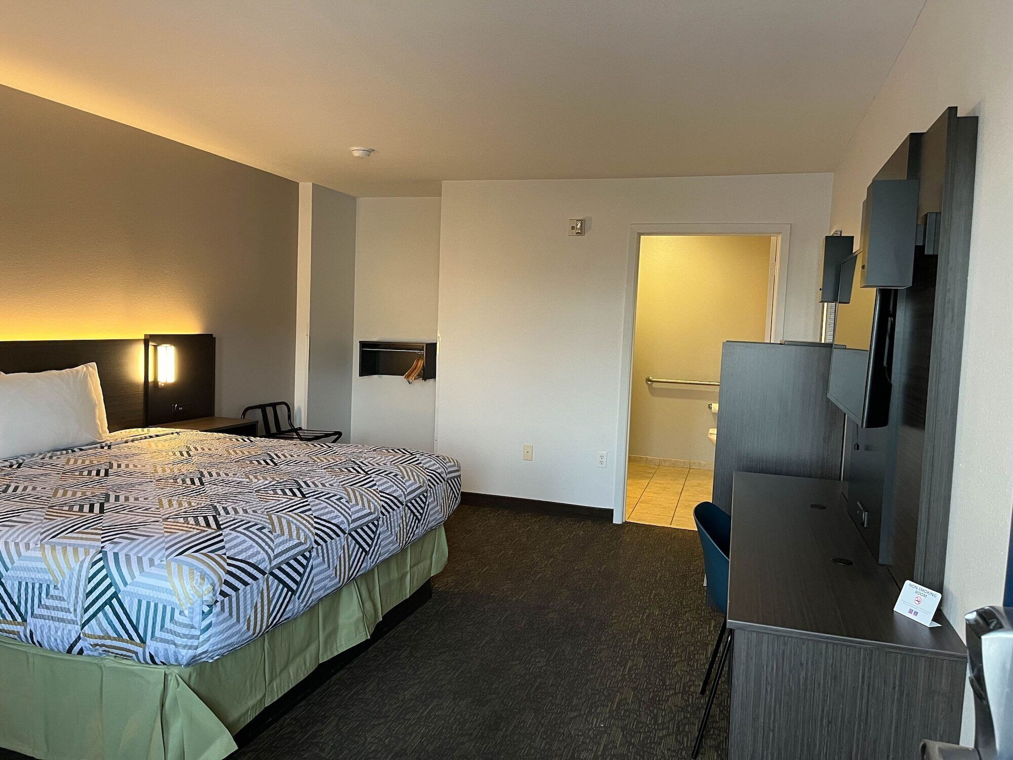 Desk, laptop workspace, blackout drapes, soundproofing