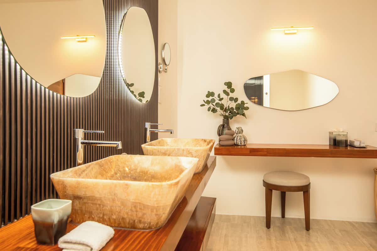 suite, 3 bedrooms, ocean view, beachfront | bathroom | eco-friendly toiletries, hair dryer, bathrobes, slippers