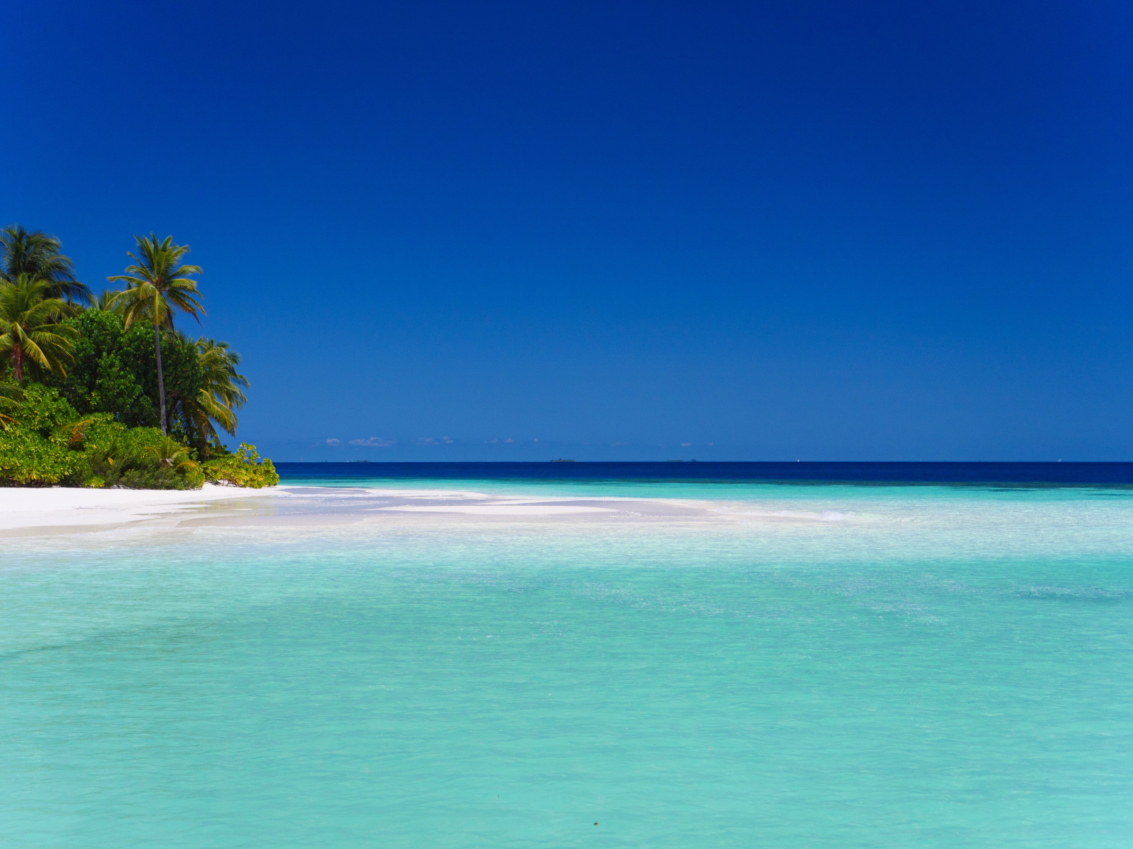 Private beach, white sand, sun loungers, beach umbrellas