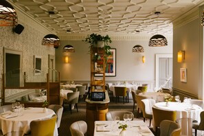 Breakfast, lunch, dinner served; local cuisine, garden views 
