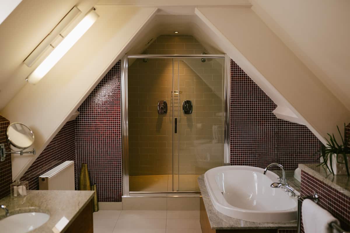 the apartment | egyptian cotton sheets, hypo-allergenic bedding, minibar, in-room safe