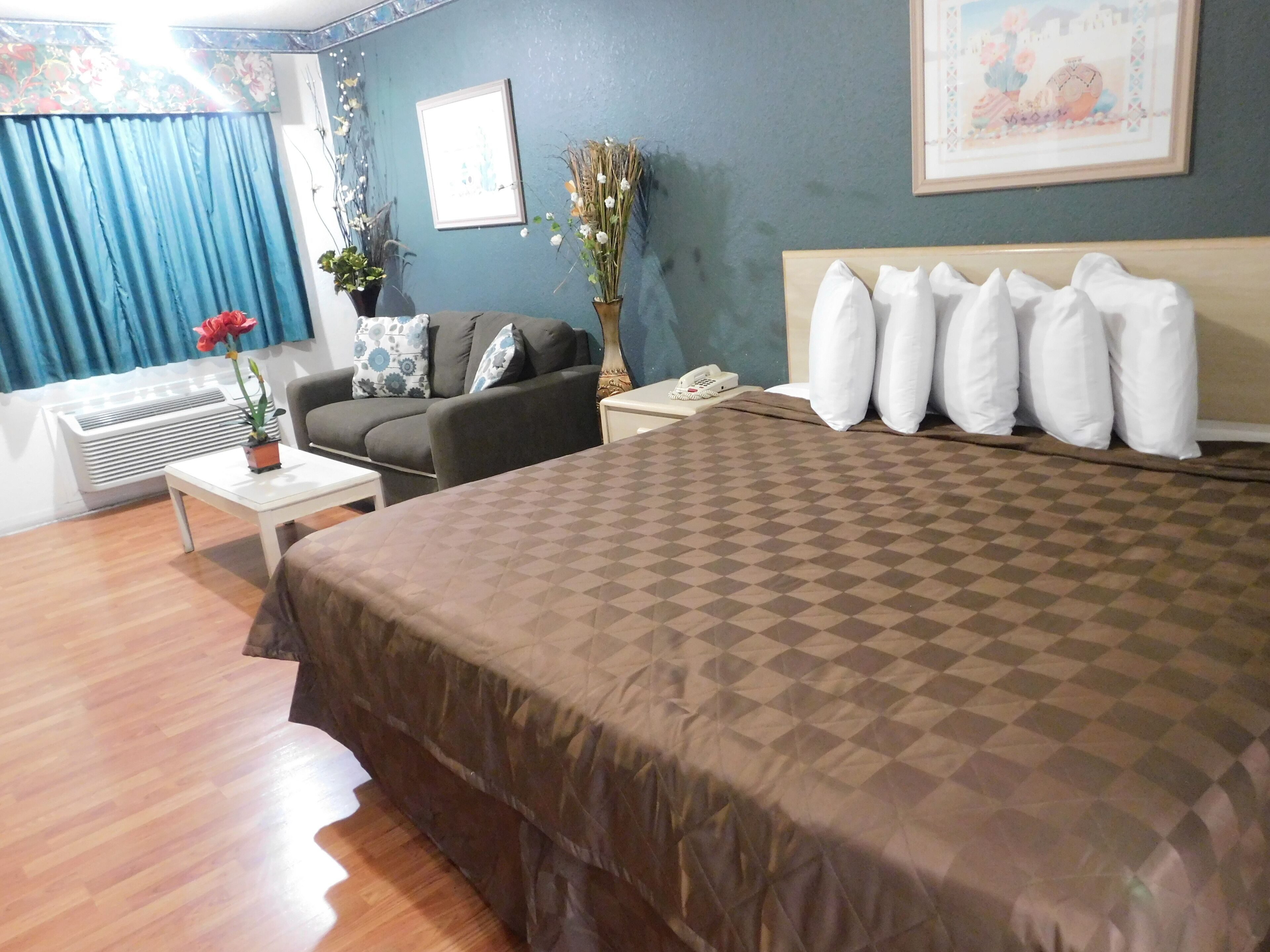 Desk, laptop workspace, blackout curtains, iron/ironing board