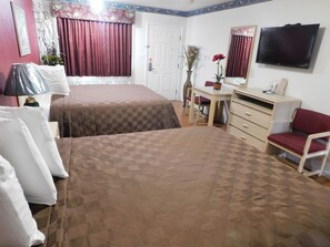 Desk, laptop workspace, blackout curtains, iron/ironing board