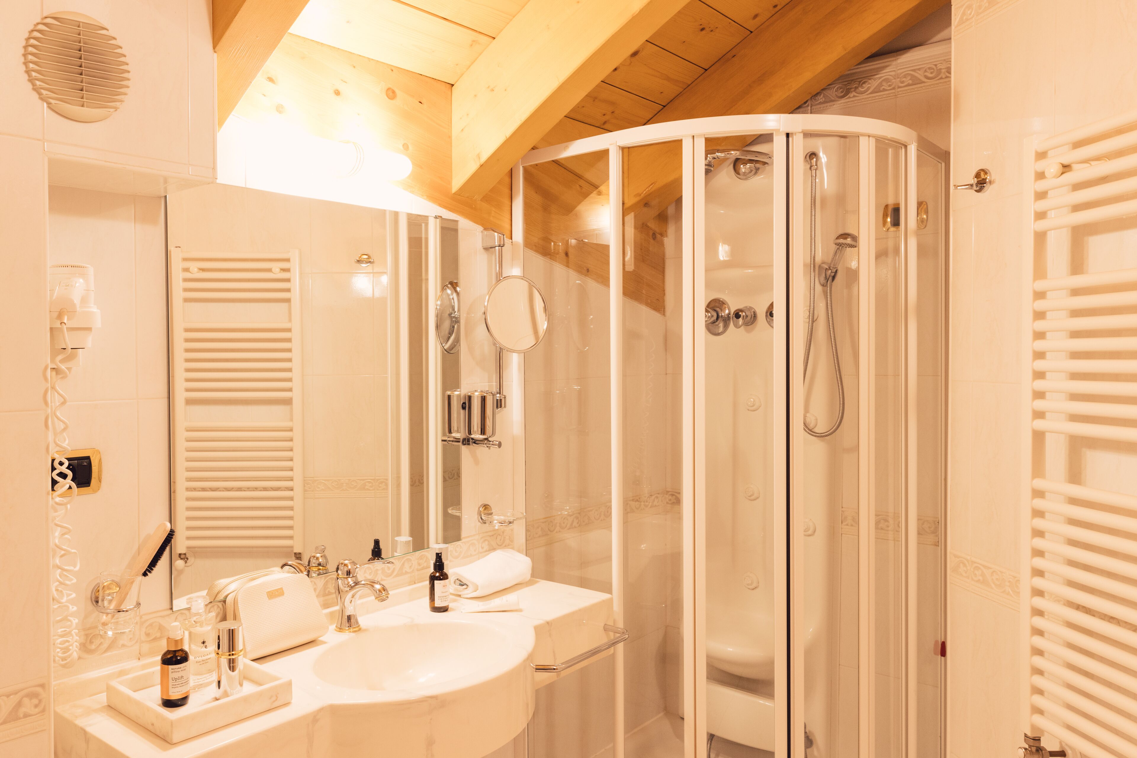 romantic suite | bathroom | designer toiletries, hair dryer, bathrobes, slippers