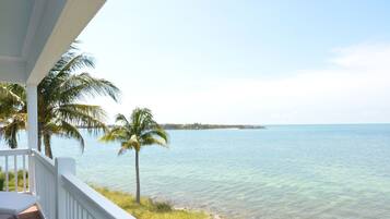 Enjoy a tranquil beachfront setting with a clear ocean view from the balcony.