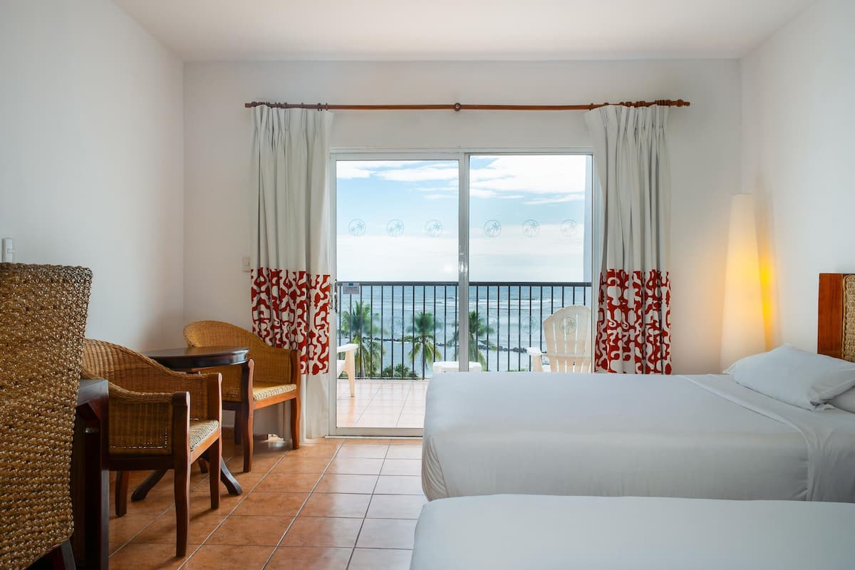 Sea View, 2 Double Beds | Premium bedding, in-room safe, desk, iron/ironing board (on request)