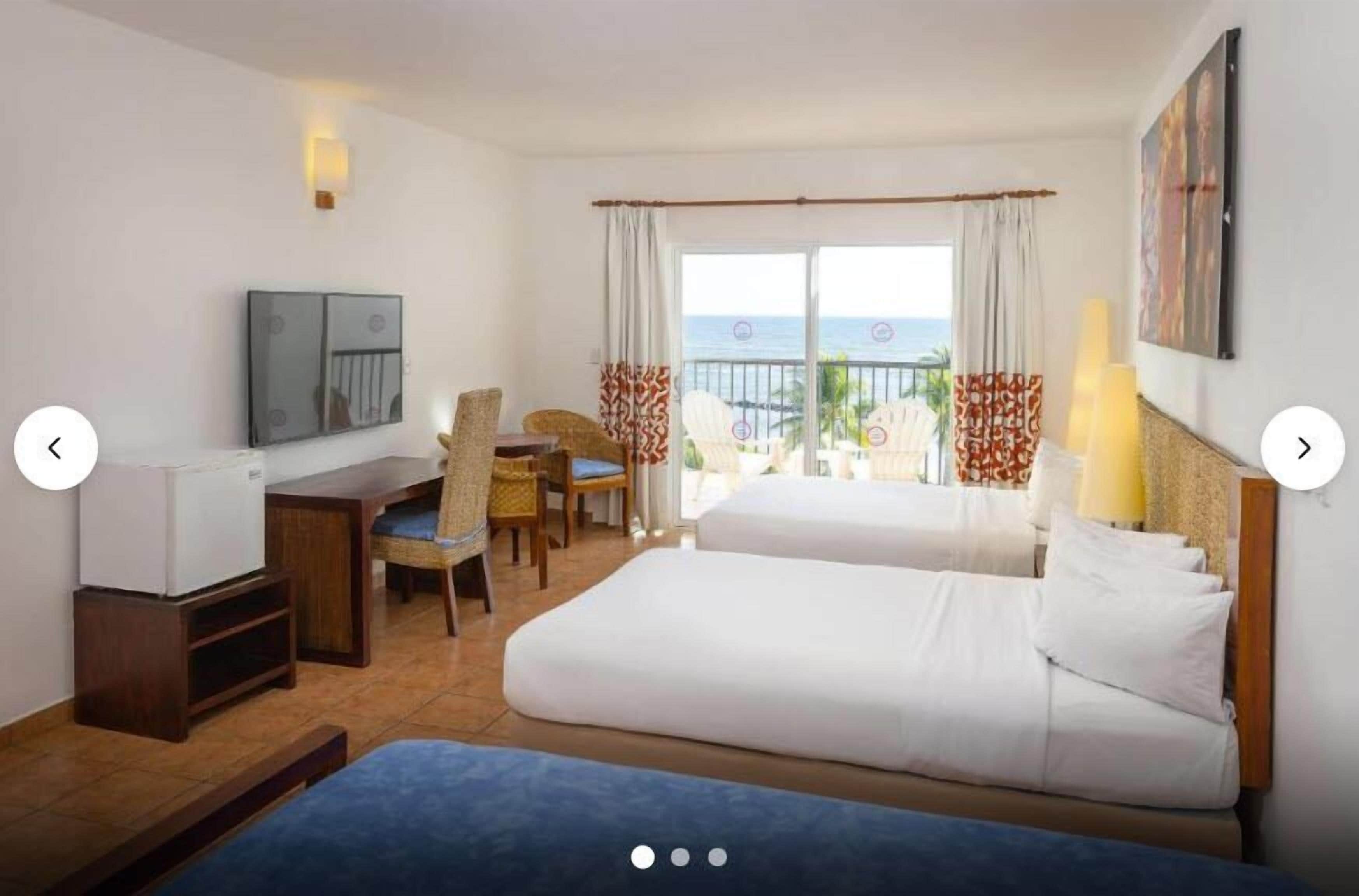 Superior, Sea View, 2 Double Beds | Premium bedding, in-room safe, desk, iron/ironing board