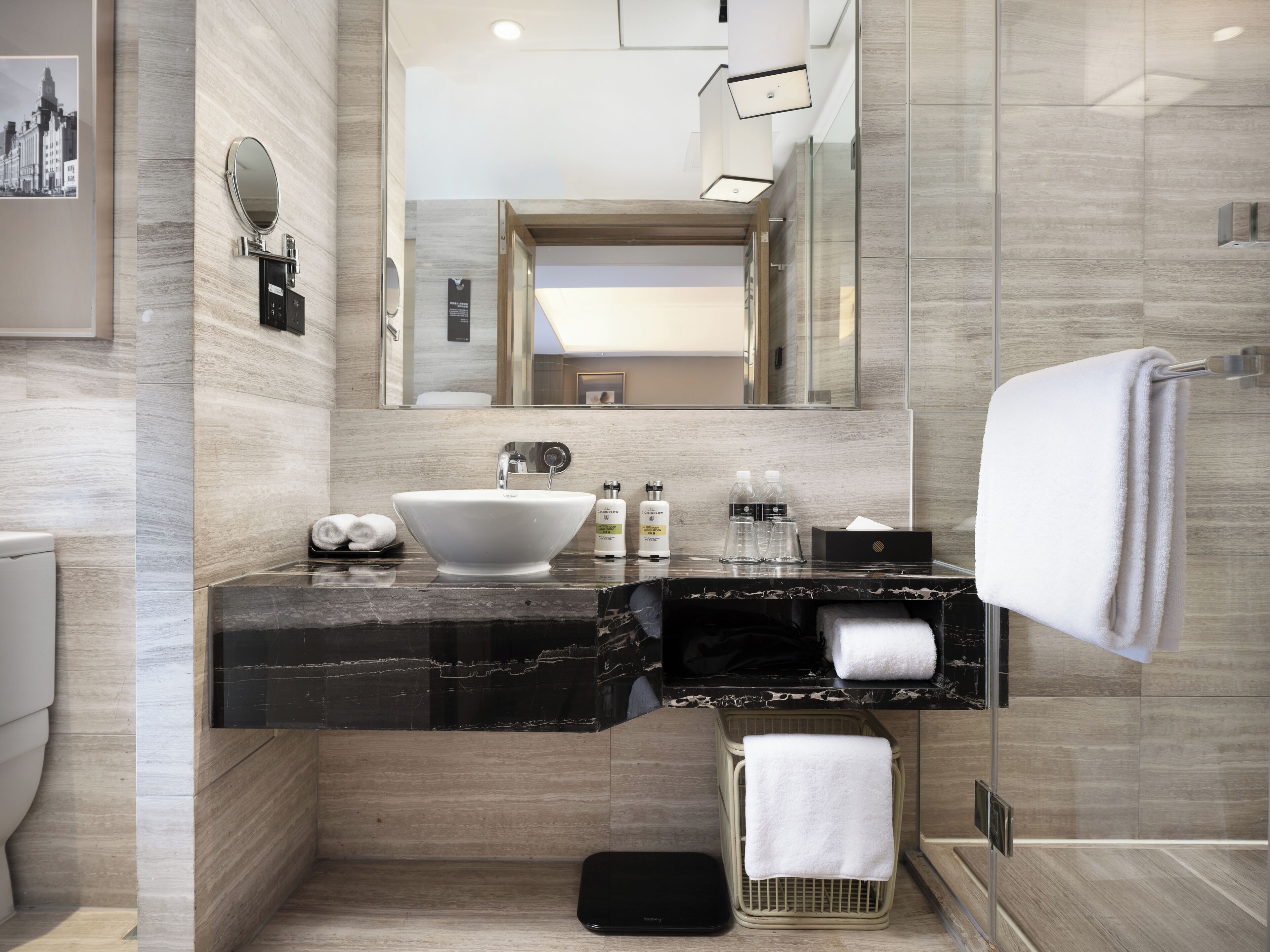 Eco-friendly toiletries, hair dryer, slippers, towels