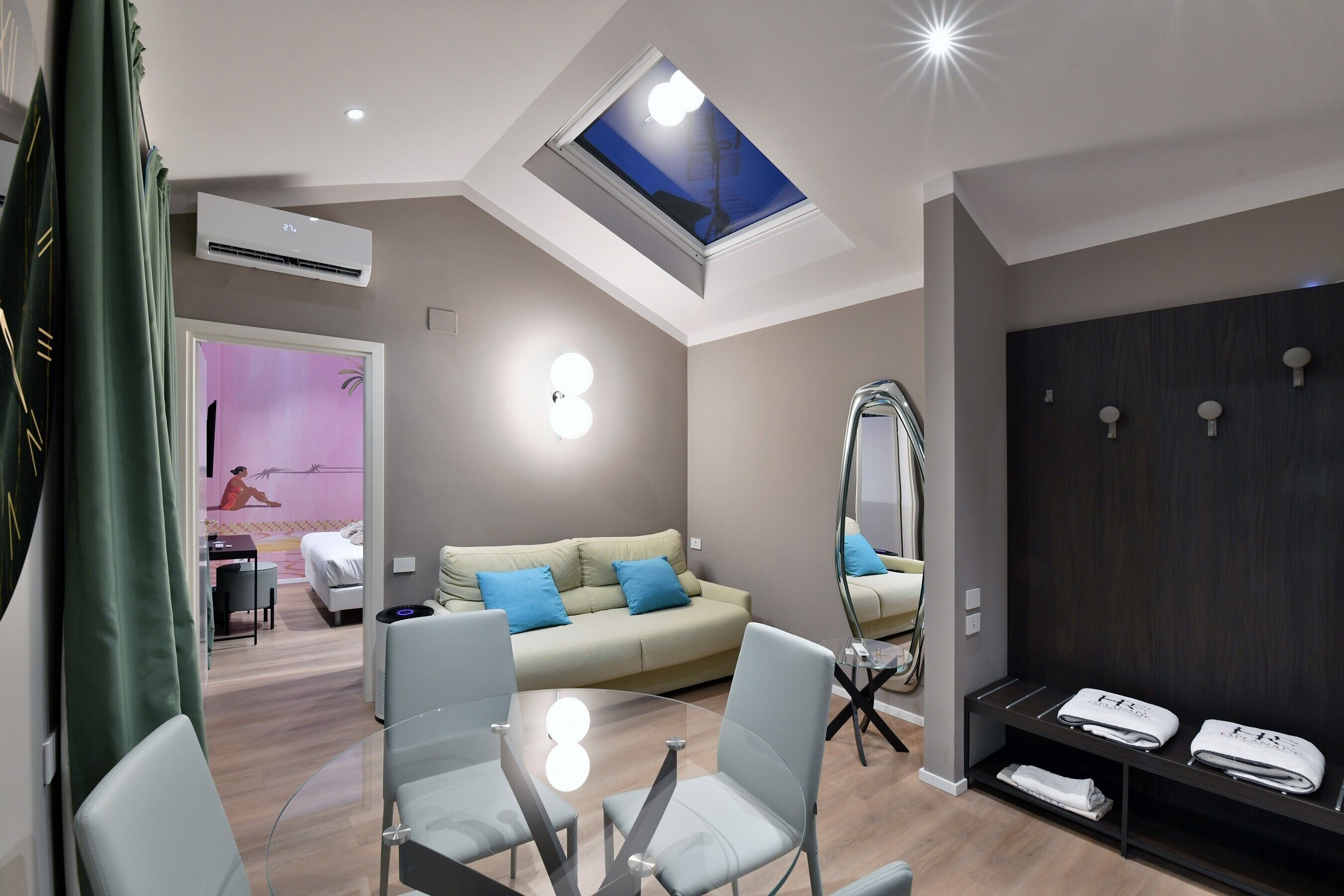 suite with spa bath and sauna | living area | 28-inch lcd tv with satellite channels, tv, first-run films