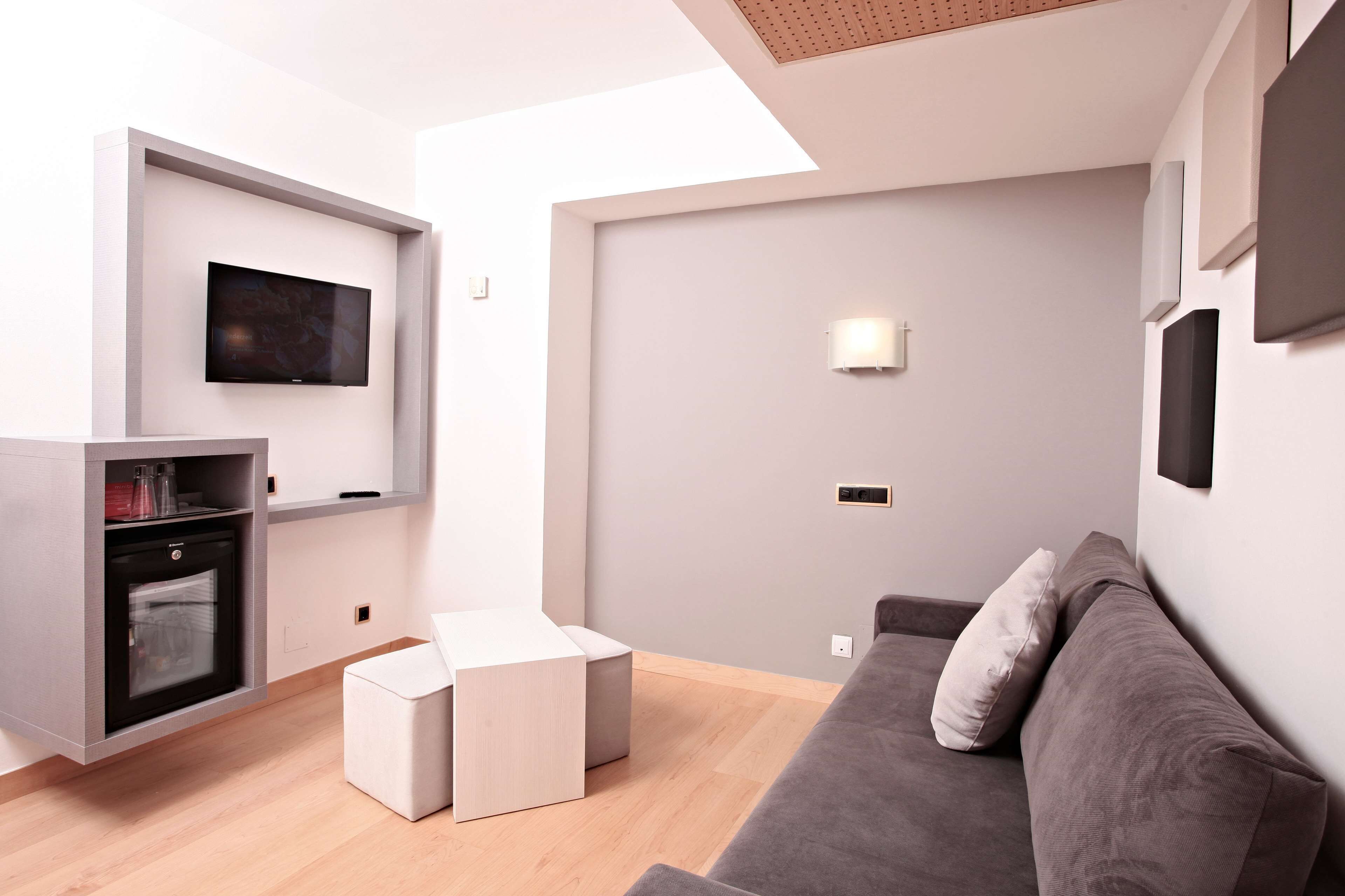 family room | 1 bedroom, minibar, desk, blackout curtains