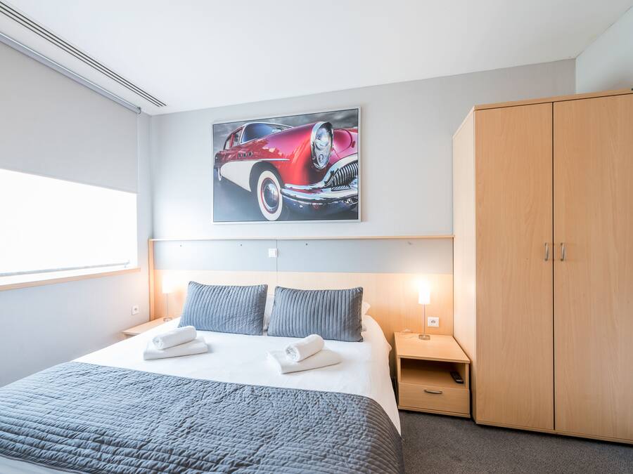 Superior Apartment, 1 Bedroom (DBL) | Desk, laptop workspace, blackout drapes, iron/ironing board