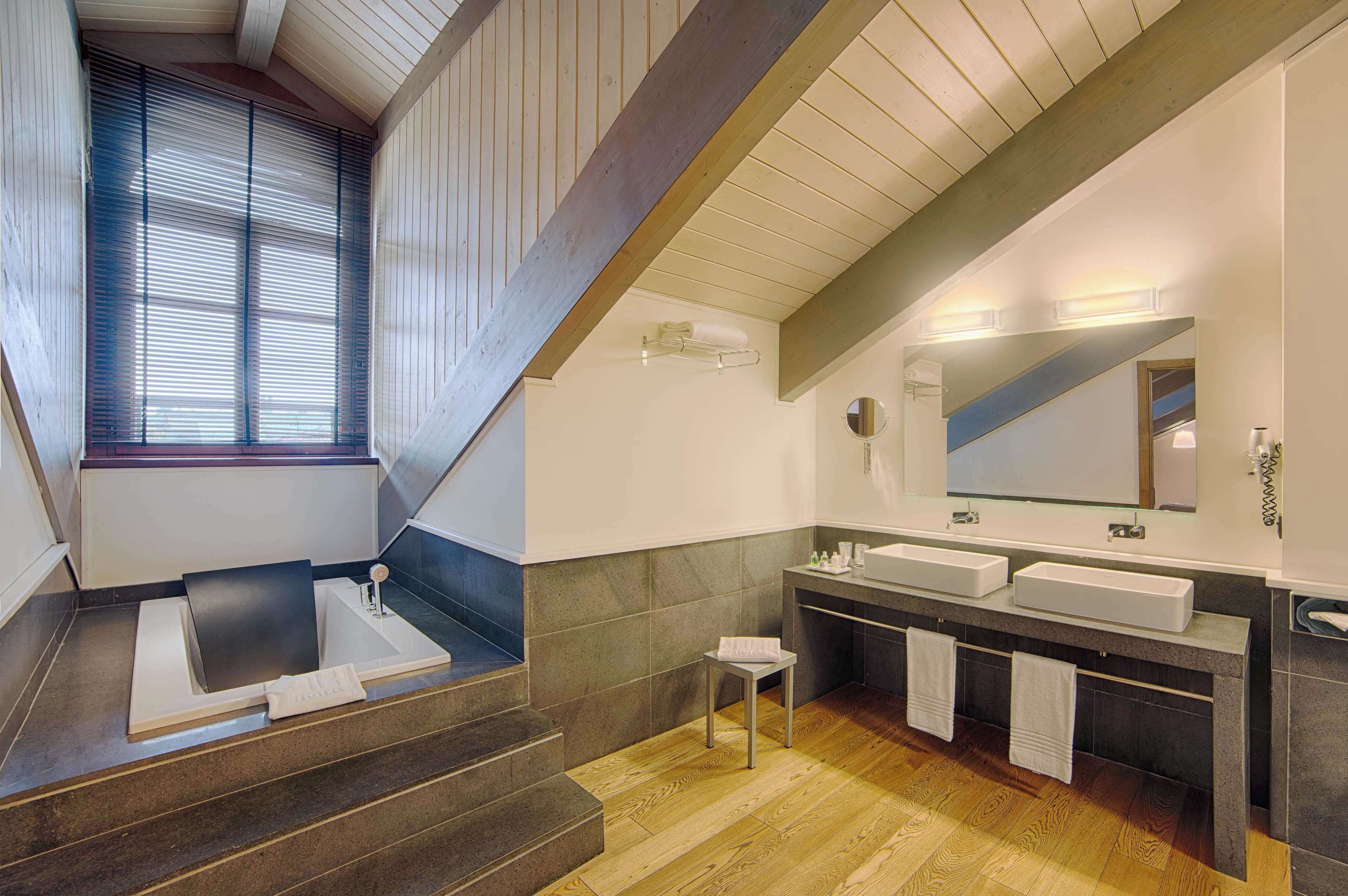 eco-friendly toiletries, hair dryer, bidet, towels