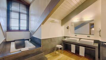 Eco-friendly toiletries, hair dryer, bidet, towels