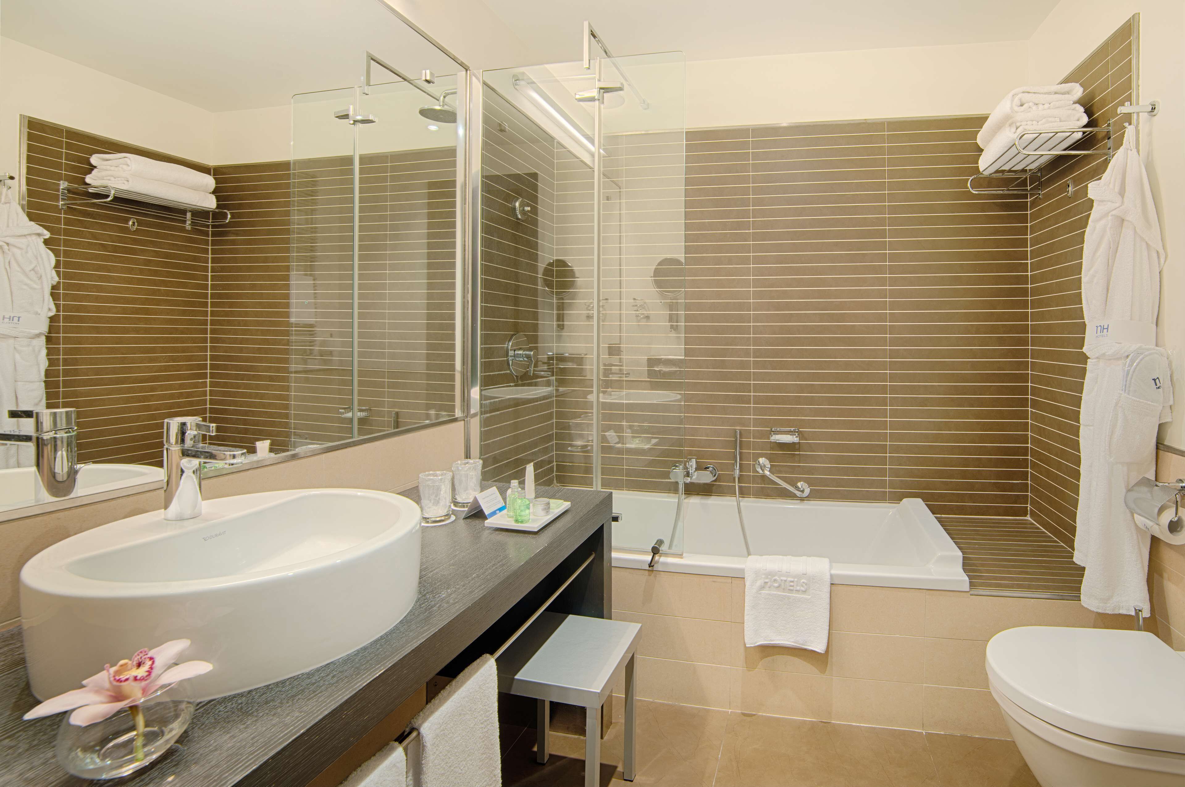 eco-friendly toiletries, hair dryer, bidet, towels