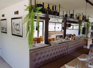 Breakfast, lunch, dinner served; local cuisine, beach views