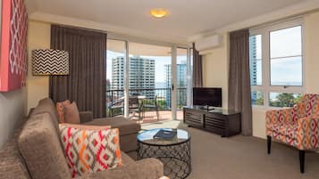 1 Bedroom Superior Apartment | Living area | 40-inch TV with digital channels, DVD player