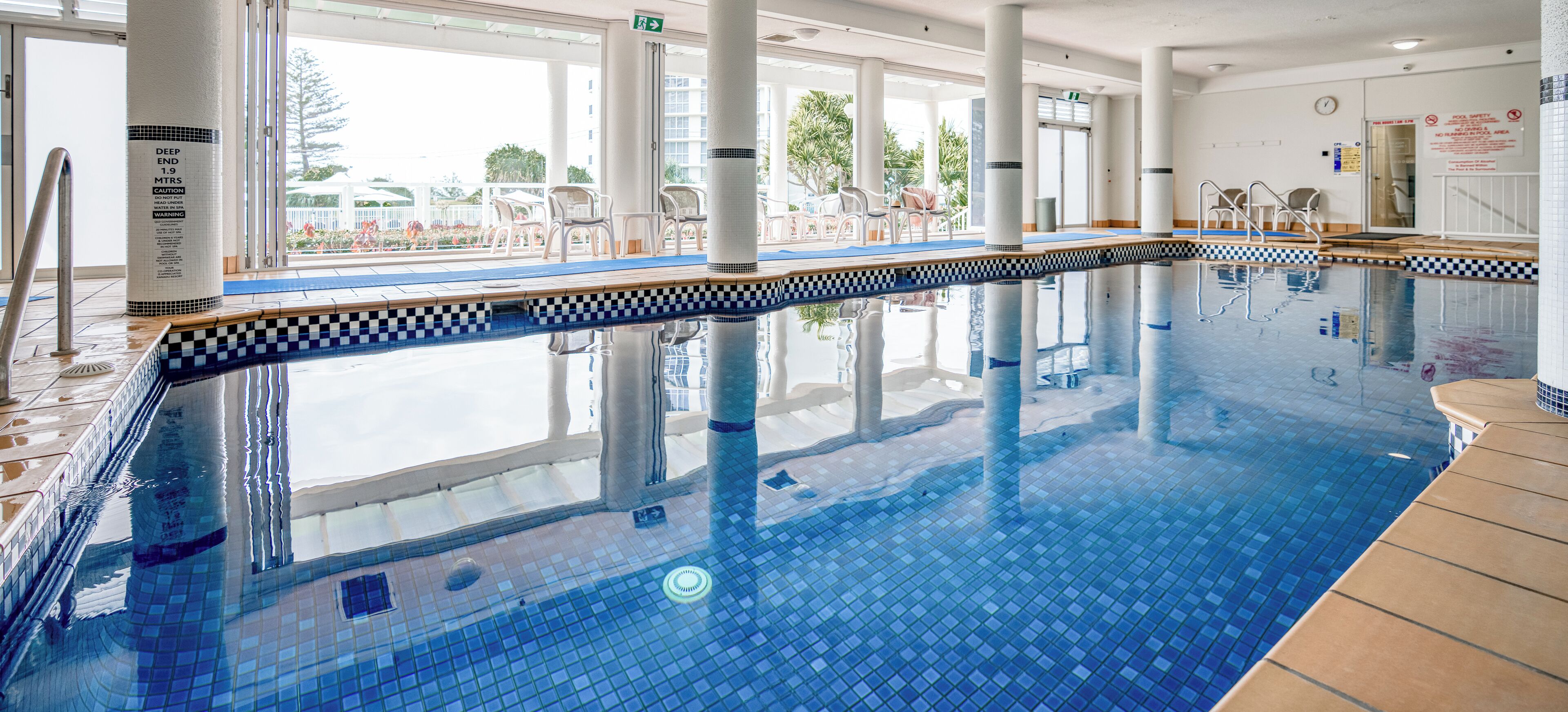 Indoor pool, outdoor pool, open 7:00 AM to 9:00 PM, pool loungers