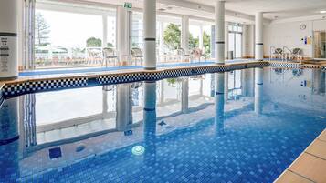 Indoor pool, outdoor pool, open 7:00 AM to 9:00 PM, pool loungers