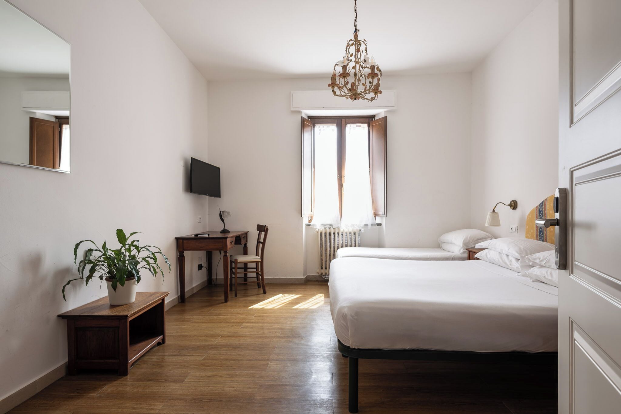 Standard Triple Room | In-room safe, desk, laptop workspace, blackout drapes