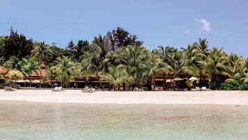 Private beach, white sand, sun loungers, beach umbrellas