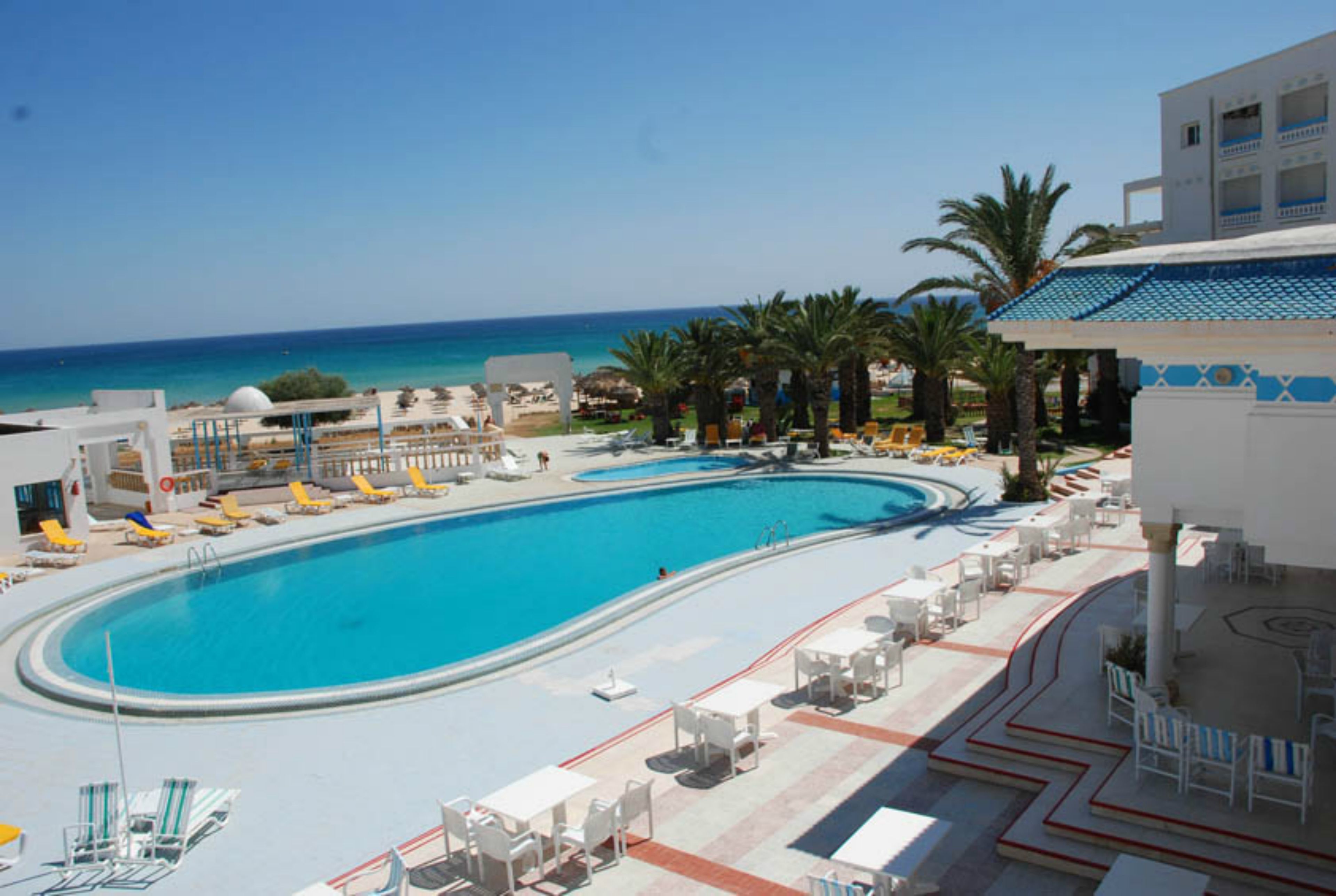 Indoor pool, outdoor pool, pool umbrellas, sun loungers