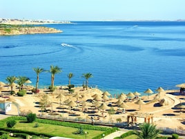 Private beach, beach cabanas, beach towels, beach massages