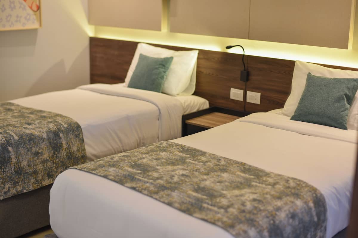 Chambre Deluxe (Family) | 1 chambre, minibar, coffres-forts dans les chambres