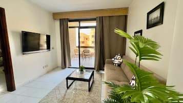 Suíte executiva, 1 cama Queen e sofá-cama | Cortinas blackout, camas extras/dobráveis (sobretaxa), roupa de cama