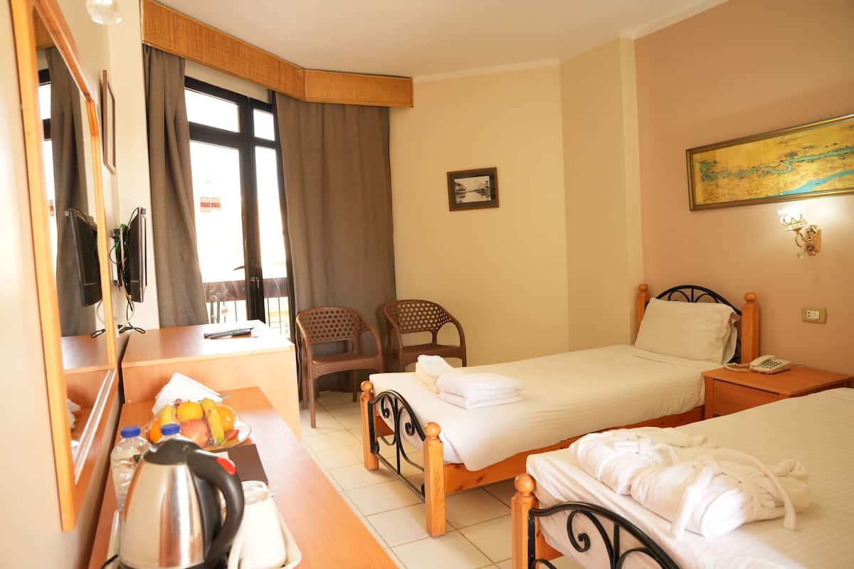 Deluxe Double or Twin Room | Blackout drapes, individually furnished, bed sheets