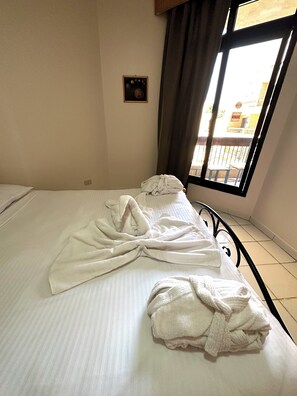 Family Room | Blackout drapes, free cribs/infant beds, rollaway beds, bed sheets - Gaddis Hotel (Luxor)