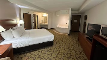 Deluxe Room, 1 King Bed, Non Smoking | In-room safe, desk, iron/ironing board, free cribs/infant beds
