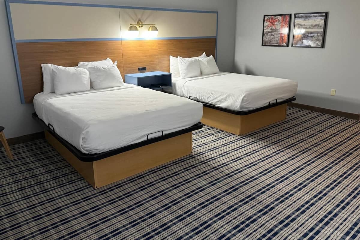 Room, 2 Queen Beds, Non Smoking | In-room safe, desk, iron/ironing board, free cribs/infant beds