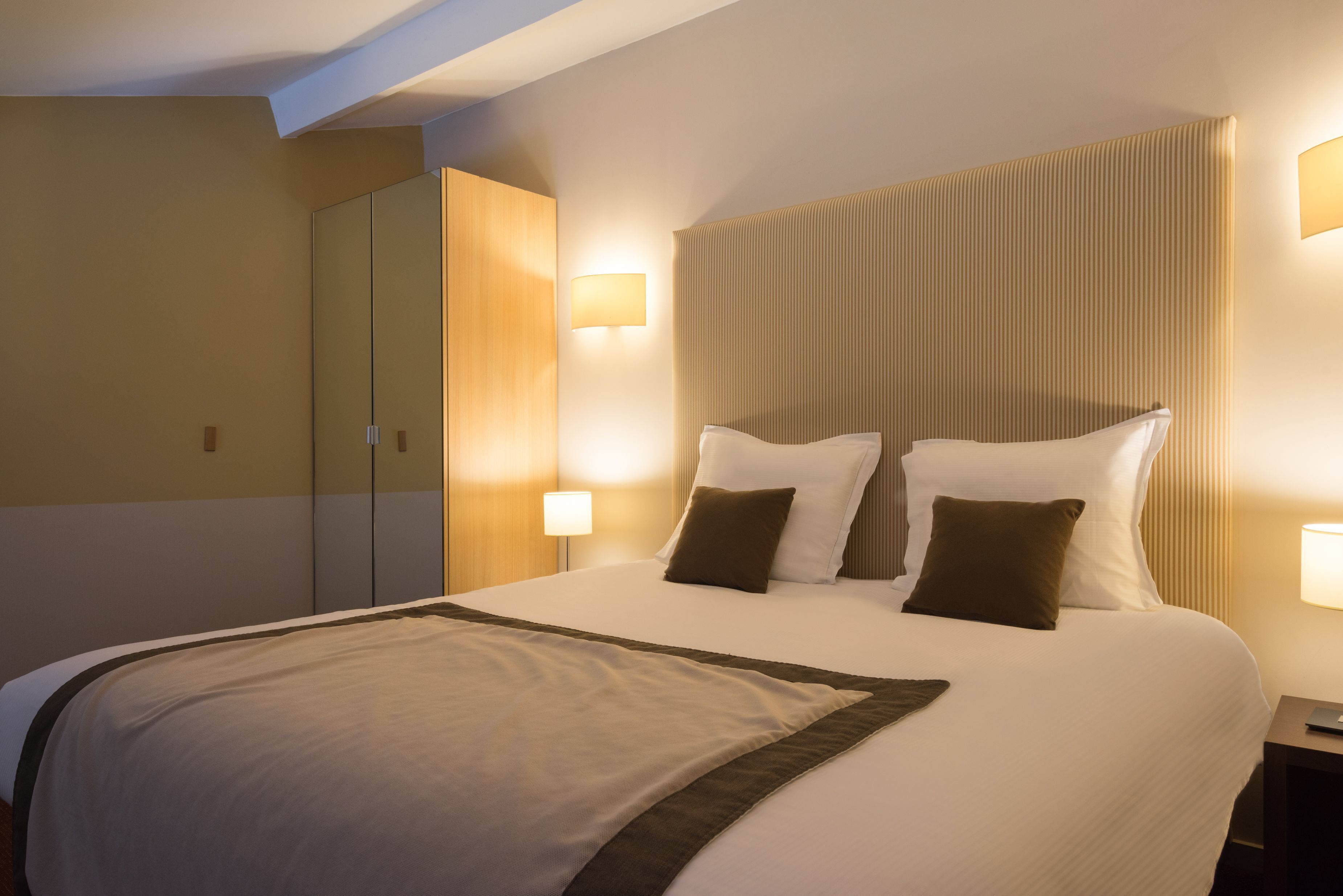 Premium bedding, pillow-top beds, minibar, in-room safe