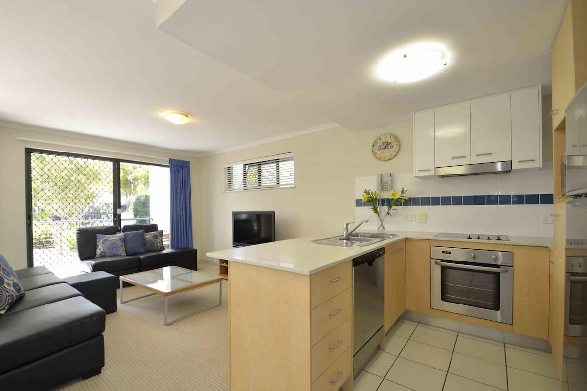 Two Bedroom Townhouse | Private kitchen | Microwave, stovetop, dishwasher, coffee/tea maker