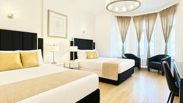 Habitación cuádruple estándar, 2 camas Queen size | Insonorización, tabla de planchar con plancha y wifi gratis