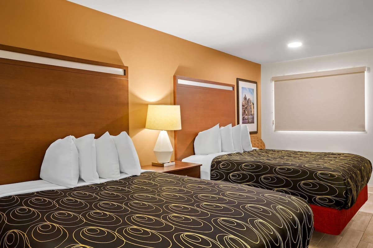 Standard Room, 2 Queen Beds, Non Smoking | Down comforters, desk, blackout drapes, iron/ironing board