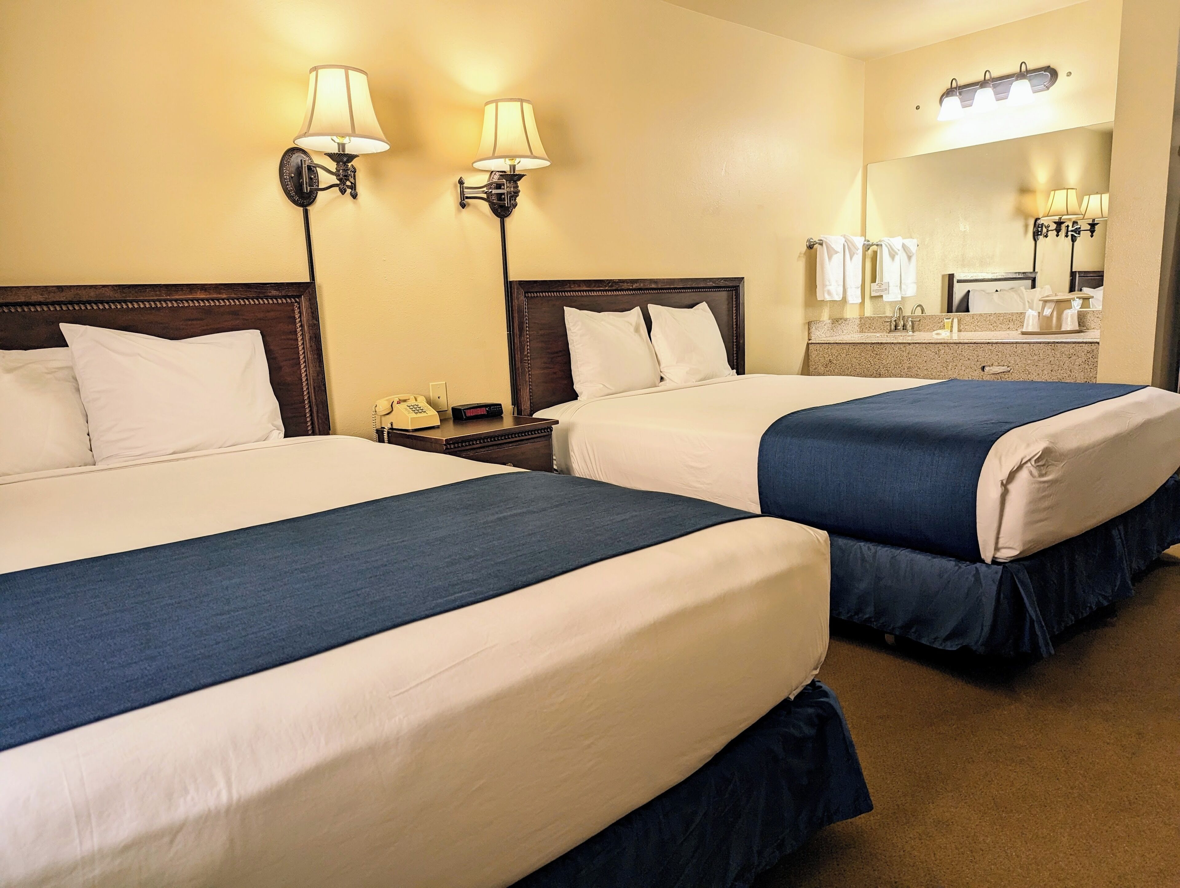 room, 2 queen beds | in-room safe, iron/ironing board, rollaway beds, free wifi