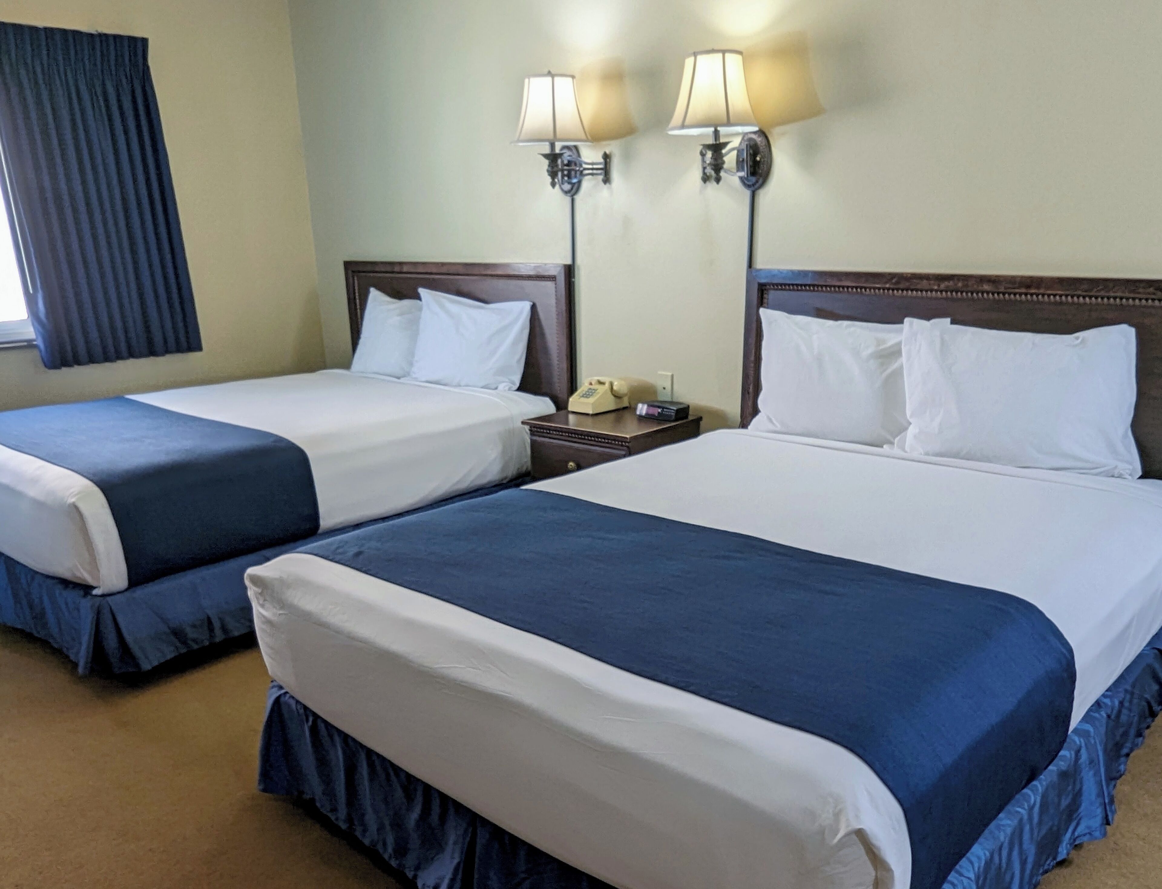 room, 2 queen beds | in-room safe, iron/ironing board, rollaway beds, free wifi