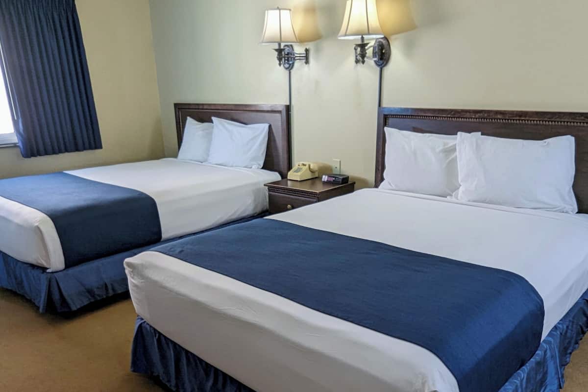 room, 2 queen beds | in-room safe, iron/ironing board, rollaway beds, free wifi