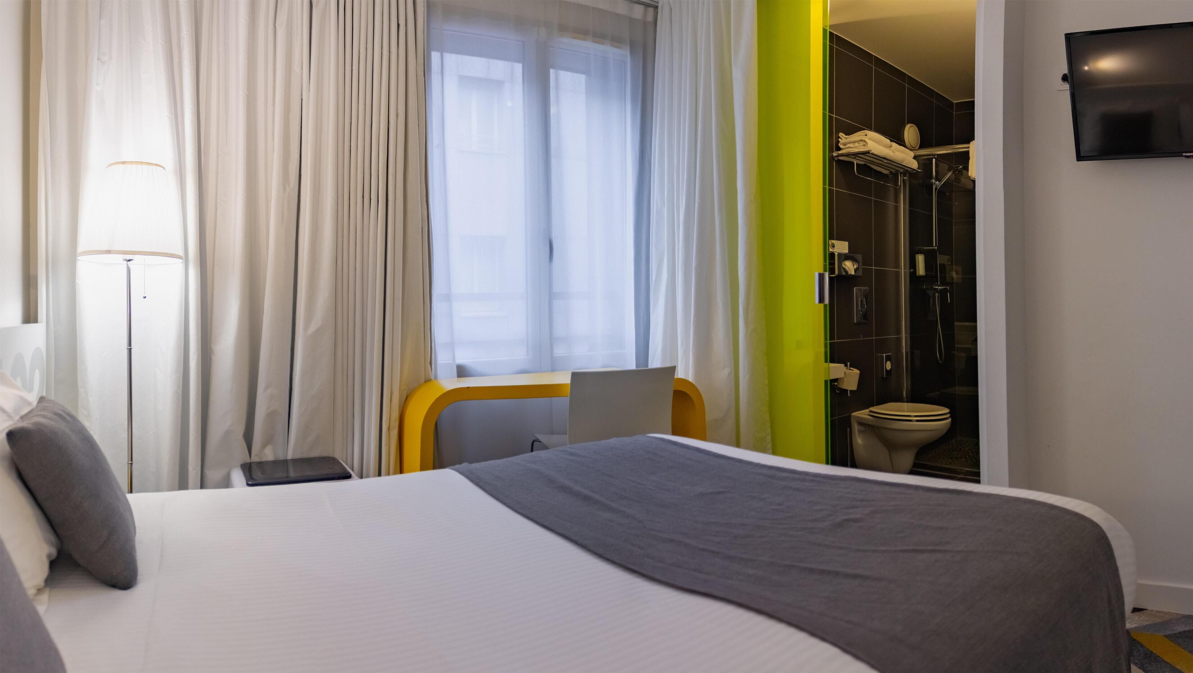 Chambre classique, 1 lit double, non-fumeur | Coffre-fort pour ordinateur portable, ameublement unique, bureau