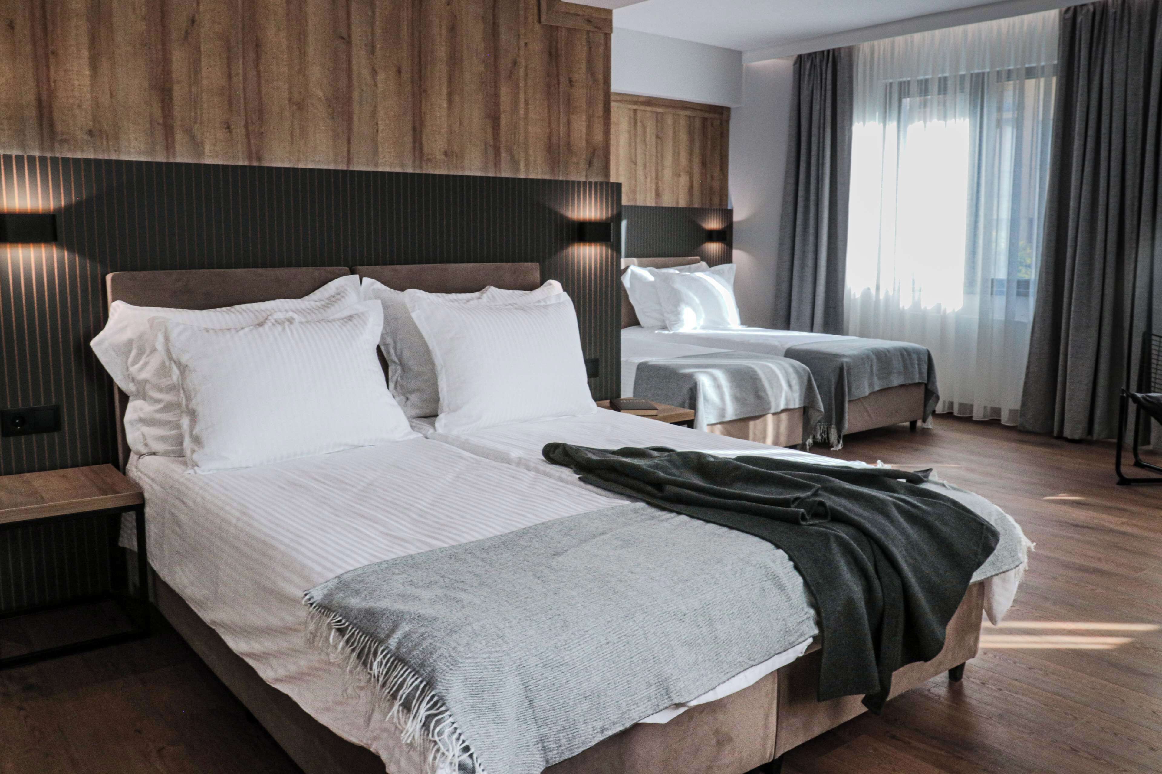 Junior Suite, Multiple Beds, Non Smoking | Minibar, in-room safe, desk, iron/ironing board