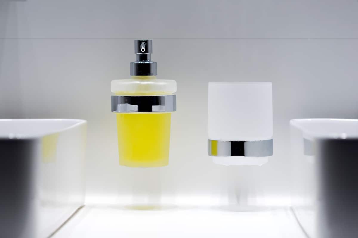 shower, hair dryer, slippers, towels