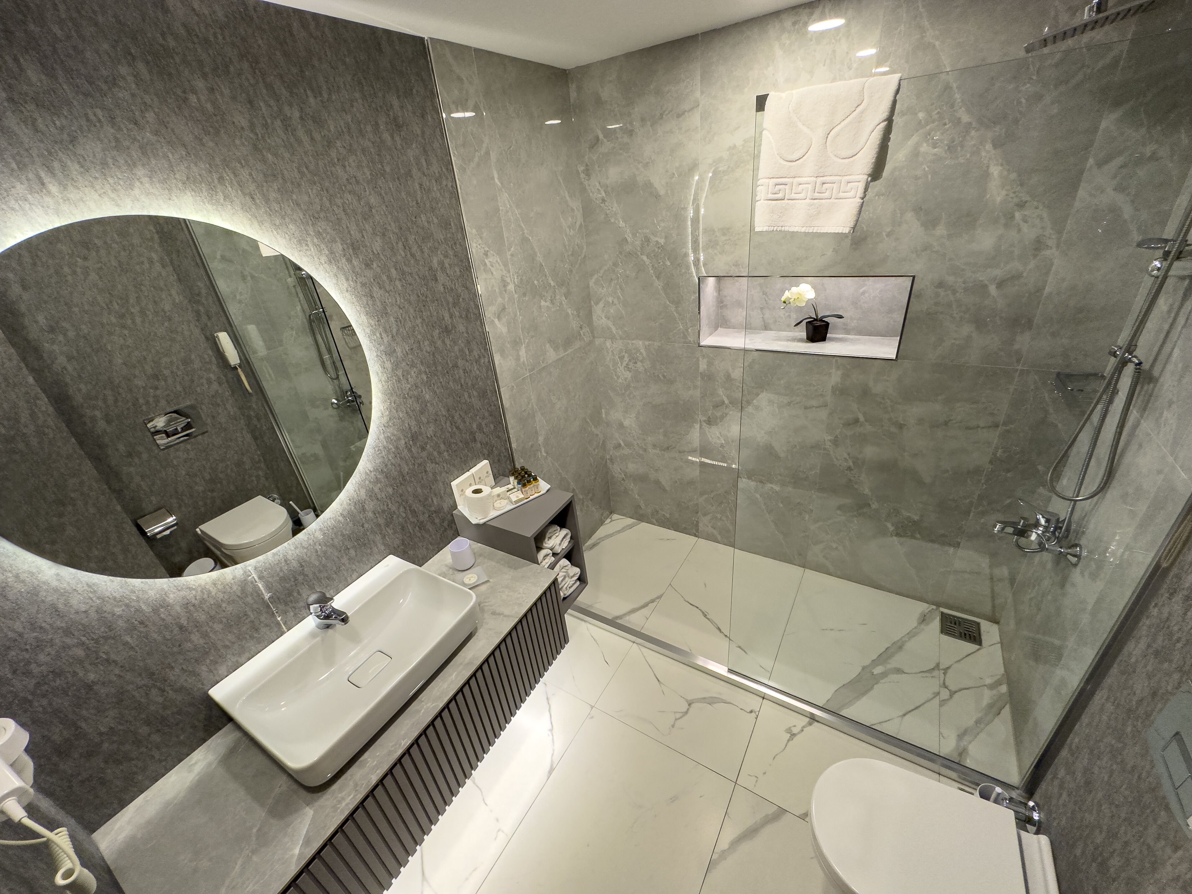 Shower, free toiletries, hair dryer, slippers