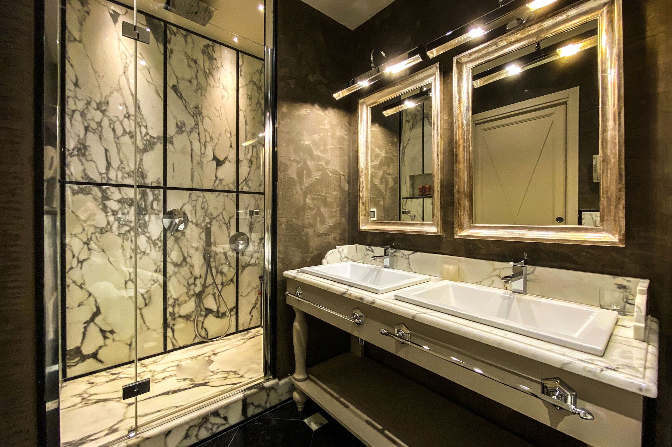 mini suite | bathroom | designer toiletries, hair dryer, bathrobes, slippers