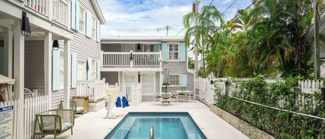 Outdoor pool, open 7:00 AM to 10:00 PM, sun loungers