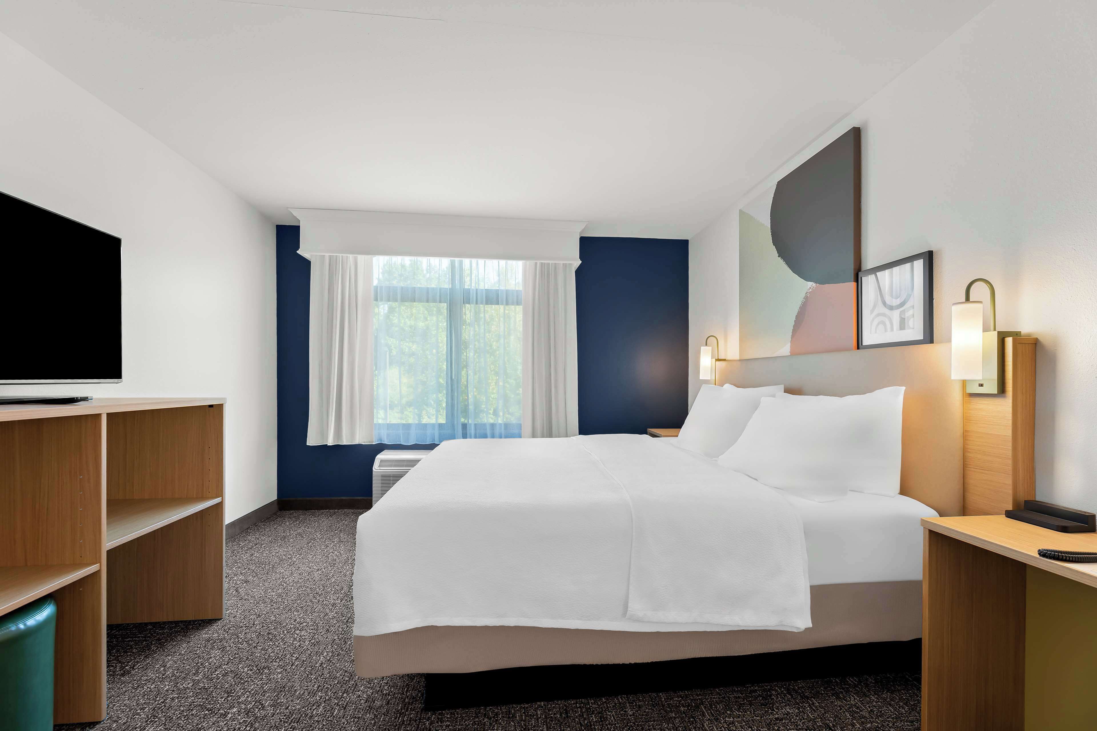 room, 1 king bed with sofa bed | in-room safe, desk, iron/ironing board, free cots/infant beds