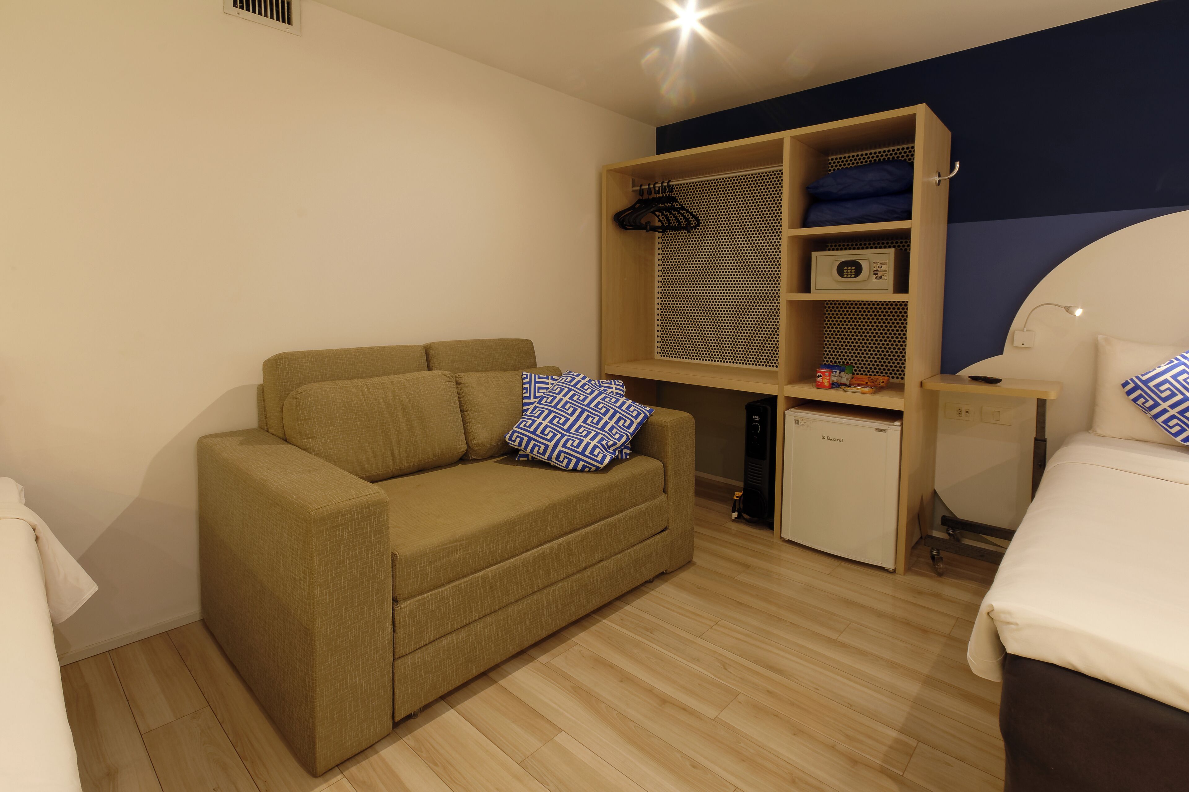 family room | 1 bedroom, minibar, individually decorated, desk