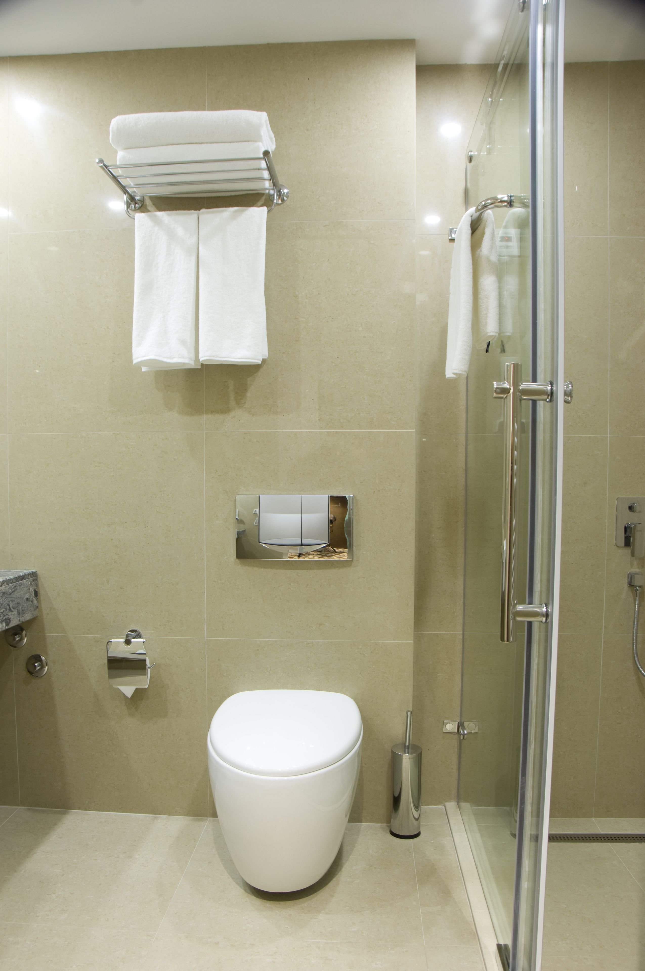 shower, rainfall showerhead, designer toiletries, hair dryer