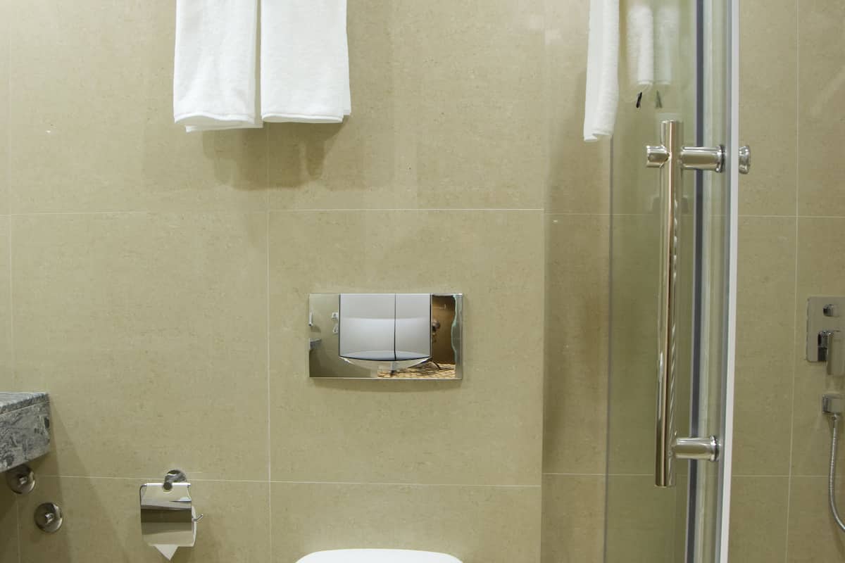 shower, rainfall showerhead, designer toiletries, hair dryer